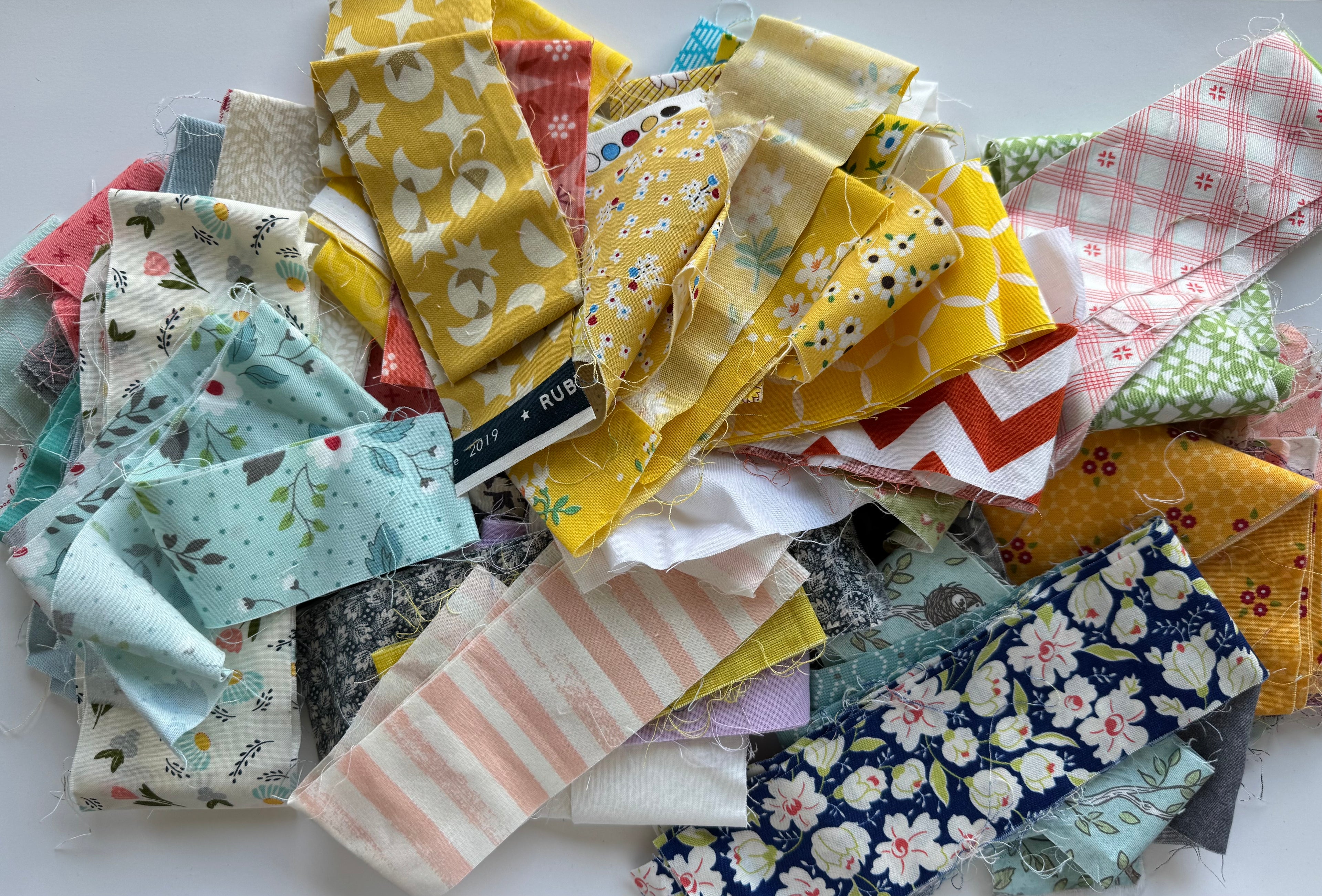 Precut 2.5" Strips Scrap Bag- 1lb of Jelly Roll-Style Designer Fabric